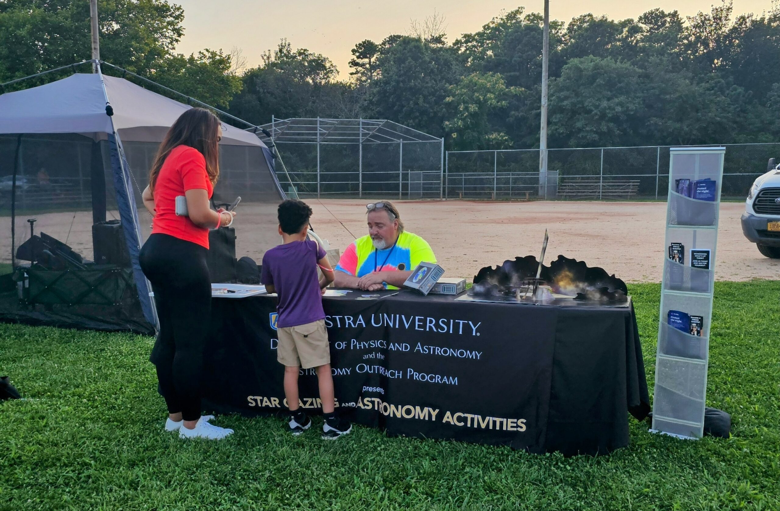 Parent and child at welcome table