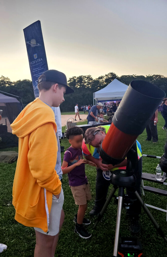 AOS President takes a peek through telescope